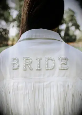 White pearl embellished fringe jean jacket for bride from Etsy