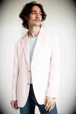 Pink herringbone blazer for casual wedding guest
