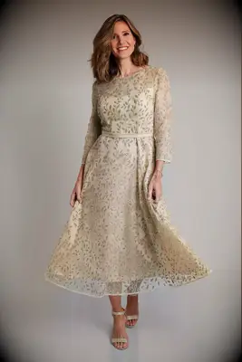 Gold midi length dress with sleeves