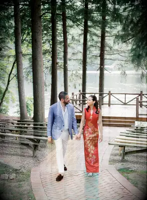 Bride in classic qipao and groom in Western attire