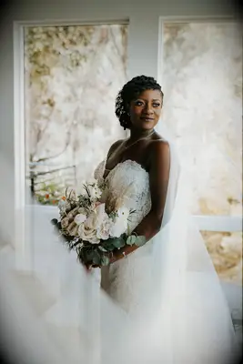 Bride looks off into the distance. 