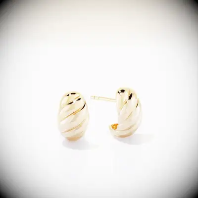 Mujuri gold croissant huggie earrings