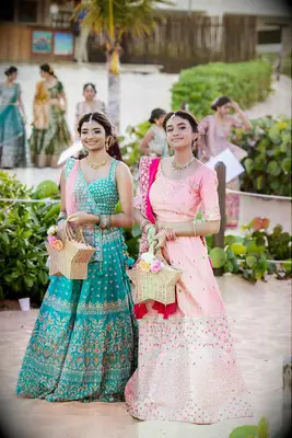 Beautiful guests wearing traditional wedding attire
