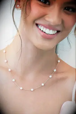 Pearl and gold chain necklace