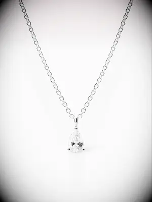 Teardrop diamond on a silver chain necklace