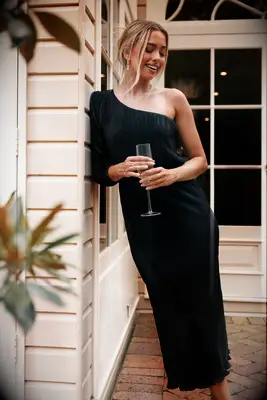 Asymmetrical black pleated midi dress