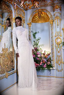 Long sleeve beaded wedding dress by Esé Azénabor