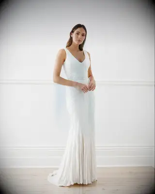 Beaded sleeveless wedding dress by Mrs. Fray. 