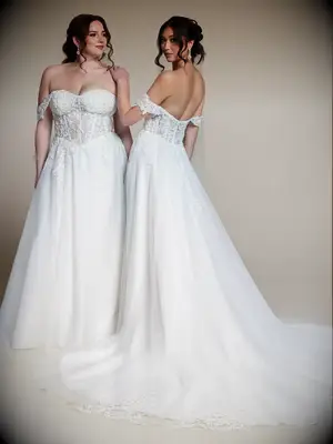 Off-the-shoulder wedding dress with lace bodice