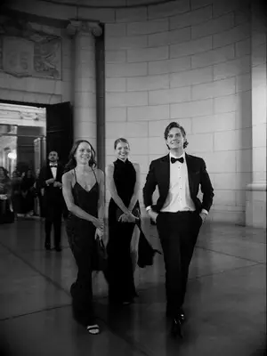 Wedding guests in black-tie attire 