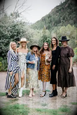 Guests wearing mountain chic wedding attire