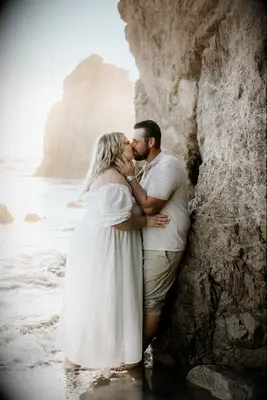 Couple kissing on a beach
