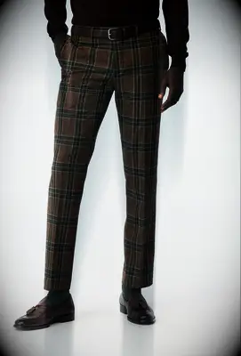 Plaid brown pants with green accent for mens wedding guest outfit