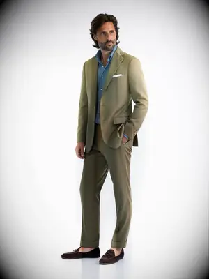 Green suit for fall wedding guest