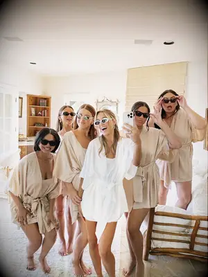 Bride posing with her bridesmaids