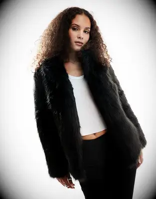 Faux fur jacket for wedding guest to wear over dress