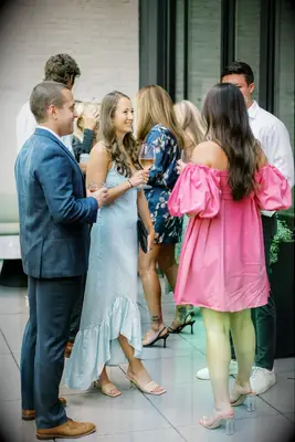 Guests wearing casual attire at summer wedding