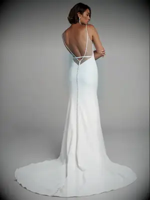 Deep V illusion panels on back and covered buttons