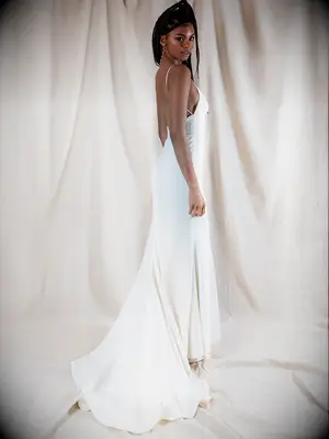 Spaghetti straps and beading on bodice with flowy train