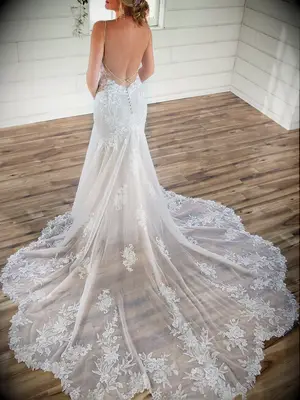Mermaid gown and tulle skirt train with floral lace