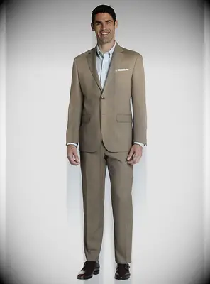 Man wearing a beige suit