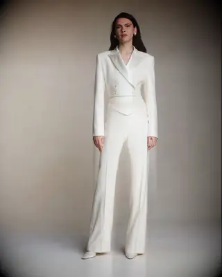 White pantsuit with short white structured jacket
