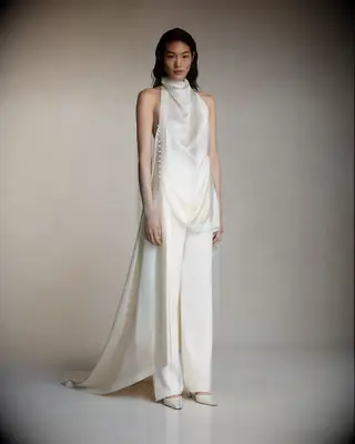 White silk pantsuit with high neck