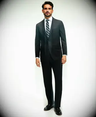 Black suit with a white dress shirt for wedding
