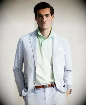 Blue and white striped suit with green polo shirt