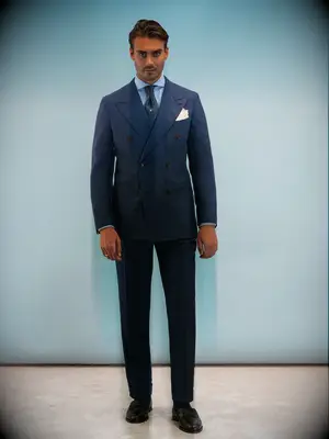 Man wearing a tailored blue suit for wedding