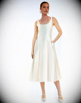 Pearl embellished tea length wedding dress for older brides from Mestiza