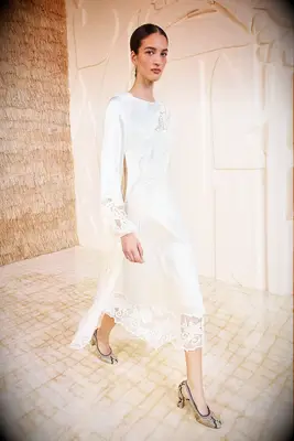 White long sleeve silk slip midi wedding dress for older brides from Ulla Johnson