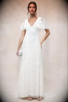 White sequin flutter sleeve wedding dress for older brides from Lulus