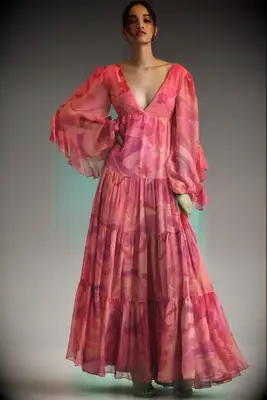 Pink floral chiffon maxi beach wedding guest dress over 50 from Anthropologie