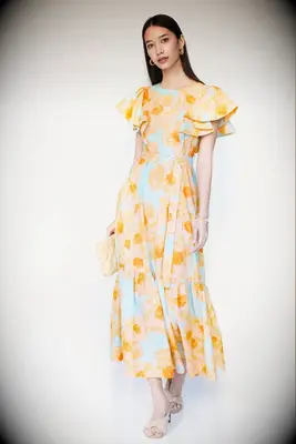 Yellow floral midi beach wedding guest dress over 50 from Rent the Runway