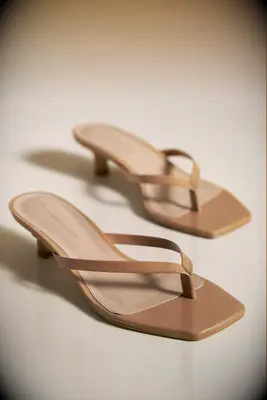 By Anthropologie nude sandals to wear with orange dress