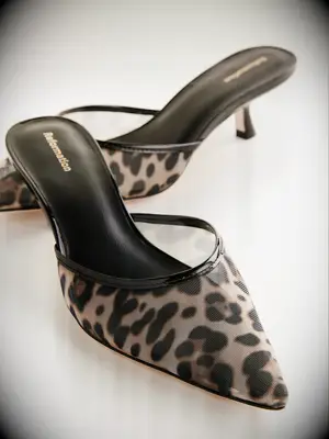 Reformation leopard print pointed toe heels to wear with brown dress