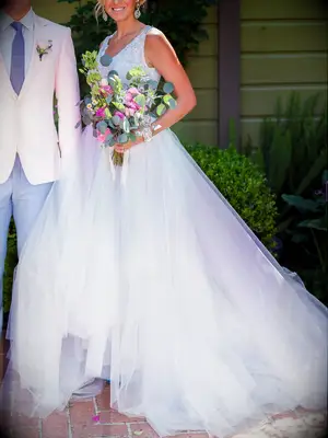 Light blue A-line wedding gown by Lazaro​