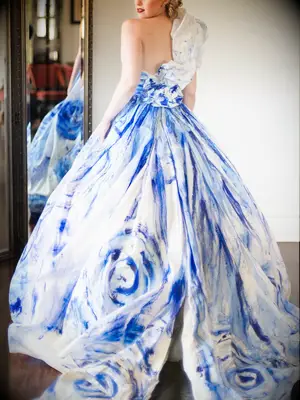 Rminé​ ball gown wedding dress with blue handpainted details