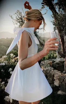 Show Me Your Mumu mini bow detail wedding dress