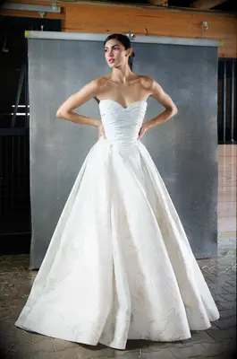 pleated strapless a-line gown with floral pattern