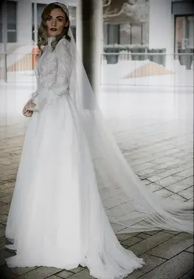 high neck lace top ball gown with long sleeves
