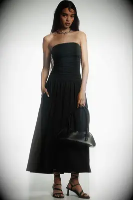 Black strapless midi affordable wedding guest dress from Anthropologie