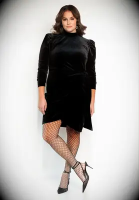 Black velevet long sleeve wrap mini dress for wedding guest from ELOQUII