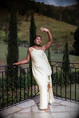 Yellow rosette affordable wedding guest dress from Petal & Pup