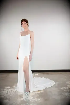 Cowl wedding dress with thin straps and leg slit