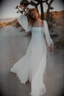 Flowy square neck wedding dress with long sleeves