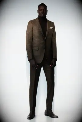 Neutral-toned suit for outdoor wedding attire