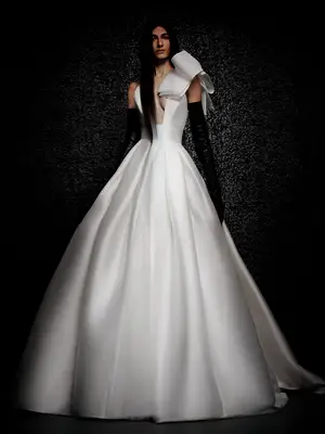 A-line ball gown with plunging neckline and oversized bow on sleeve