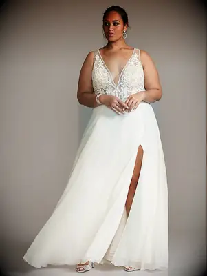 Chiffon wedding dress with slit and plunging neckline and floral applique